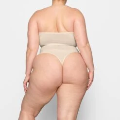 SHEER SCULPT BANDEAU | SAND -SWIM Sales Store SKIMS BRA BR BND 0254 DC SND 0036 BK