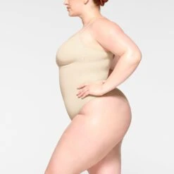 SEAMLESS SCULPT BRIEF BODYSUIT | SAND -SWIM Sales Store SKIMS SHAPEWEAR BD BRF 3370 ID SND 0007 SD