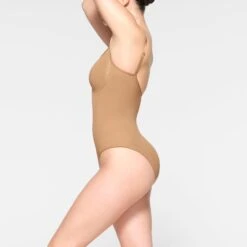 SEAMLESS SCULPT BRIEF BODYSUIT | OCHRE 7 SEAMLESS SCULPT BRIEF BODYSUIT | OCHRE -SWIM Sales Store SKIMS SHAPEWEAR BD BRF 3370 IE OCH 0010 SD f7e54e31 f383 438b 83fb 7129bfd59ad0