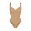 SEAMLESS SCULPT BRIEF BODYSUIT | OCHRE