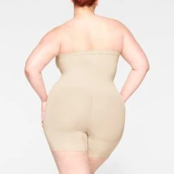 SEAMLESS SCULPT STRAPLESS SHORTIE BODYSUIT | SAND 9 SEAMLESS SCULPT STRAPLESS SHORTIE BODYSUIT | SAND -SWIM Sales Store SKIMS SHAPEWEAR BD MDT 2914 JB SND 0037 BK
