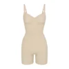 SEAMLESS SCULPT MID THIGH BODYSUIT | SAND