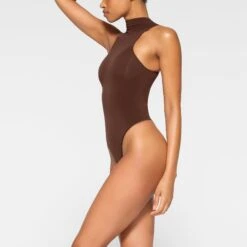 SEAMLESS SCULPT HIGH NECK THONG BODYSUIT | COCOA -SWIM Sales Store SKIMS SHAPEWEAR BD THG 2905 JA COA 0009 SD