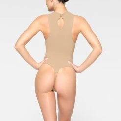 SEAMLESS SCULPT HIGH NECK THONG BODYSUIT | CLAY 8 SEAMLESS SCULPT HIGH NECK THONG BODYSUIT | CLAY -SWIM Sales Store SKIMS SHAPEWEAR BD THG 2905 JC CLY 0016 BK