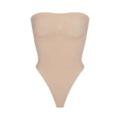 SEAMLESS SCULPT STRAPLESS THONG BODYSUIT | MICA