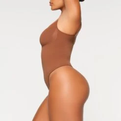 SEAMLESS SCULPT THONG BODYSUIT | BRONZE -SWIM Sales Store SKIMS SHAPEWEAR BD THG 3369 IA BRZ 0011 SD