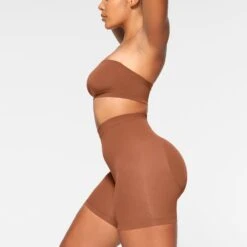 SEAMLESS SCULPT BANDEAU | BRONZE -SWIM Sales Store SKIMS SHAPEWEAR BR BAN 2895 IA BRZ 0040 SD