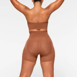 SEAMLESS SCULPT BANDEAU | BRONZE -SWIM Sales Store SKIMS SHAPEWEAR BR BAN 2895 IA BRZ 0043 BK