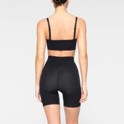 SEAMLESS SCULPT BANDEAU | ONYX -SWIM Sales Store SKIMS SHAPEWEAR BR BAN 2895 JC ONX 0012 BK