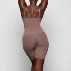 BUTT ENHANCING OPEN BUST BODYSUIT | UMBER 9 BUTT ENHANCING OPEN BUST BODYSUIT | UMBER -SWIM Sales Store SKIMS SHAPEWEAR SH BDY 2168 ZA UMB 0018