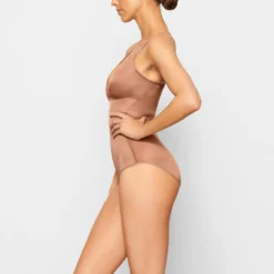 BARELY THERE BODYSUIT BRIEF W/ SNAPS | SIENNA -SWIM Sales Store SKIMS SHAPEWEAR SH BSB 1641 NB SIE SD