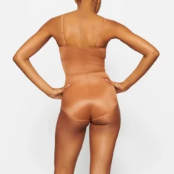 BARELY THERE BODYSUIT BRIEF W/ SNAPS | BRONZE -SWIM Sales Store SKIMS SHAPEWEAR SH BSB 1641 ND BRZ BK