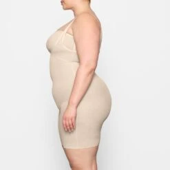 SHEER SCULPT OPEN BUST BODYSUIT | SAND -SWIM Sales Store SKIMS SHAPEWEAR SH BSS 0014 DC SND 0007 SD