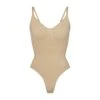 SEAMLESS SCULPT THONG BODYSUIT | CLAY