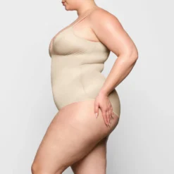 BARELY THERE BODYSUIT BRIEF W/ SNAPS | SAND -SWIM Sales Store SKIMS SHAPEWEAR SH HWS 0531 ZB SND 0009