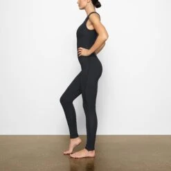 SKIMS SPORT SWIM FULL LENGTH SUIT | ONYX -SWIM Sales Store SKIMS SWIM SW BSF 0070 AD ONX 0008a SD