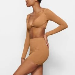 SWIM LONG SLEEVE SHRUG | ALMOND 7 SWIM LONG SLEEVE SHRUG | ALMOND -SWIM Sales Store SKIMS SWIM SW LGS 0015 MM ALM SD