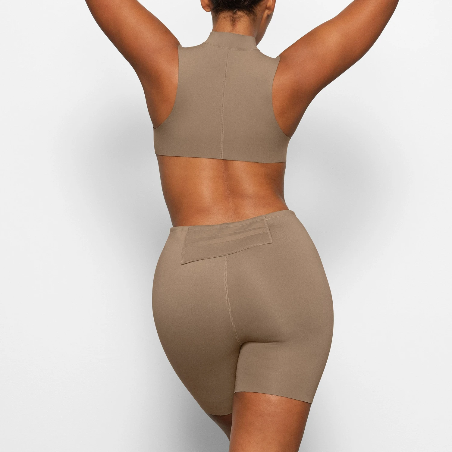 SKIMS SPORT SWIM MID THIGH SHORT | DESERT 4 SKIMS SPORT SWIM MID THIGH SHORT | DESERT - Image 4