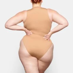 SWIM ZIP FRONT SLEEVELESS ONE PIECE | OCHRE -SWIM Sales Store SKIMS SWIM SW SLO 0149 TB OCH 0013 BK