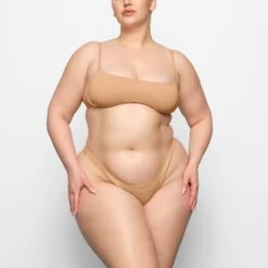 Front Page -SWIM Sales Store SKIMS SWIM SW TAN 0147 CC OCH 0002 FR