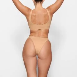 SWIM CHEEKY TANGA BOTTOMS | OCHRE -SWIM Sales Store SKIMS SWIM SW TAN 0783 MM OCH BK