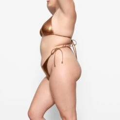 METALLIC SWIM DIPPED TIE BOTTOMS | PENNY 7 METALLIC SWIM DIPPED TIE BOTTOMS | PENNY -SWIM Sales Store SKIMS SWIM SW TBM 0067 EB PNY 0011