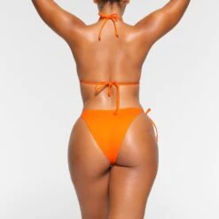 SWIM DIPPED TIE BOTTOMS | ORANGE -SWIM Sales Store SKIMS SWIM SW TBM 0797 OA ORG 0015 BK