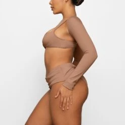 SHAPING SWIM SHRUG | SIENNA -SWIM Sales Store SKIMS SWIM TP SRG 2760 FA SIE 0026 SD x2 bbdf31c8 db2f 43ea 9b12 f7bd3528e86a