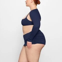 SHAPING SWIM SHRUG | MIDNIGHT -SWIM Sales Store SKIMS SWIM TP SRG 2760 FC MDN 0007 SD x2 320ccdfd ffe9 41f5 9256 25c924bd4f3b